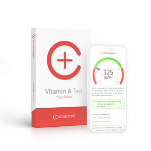 Verpackung des cerascreen Vitamin A Tests und Smartphone-Display mit Vorschau des Testergebnisses.